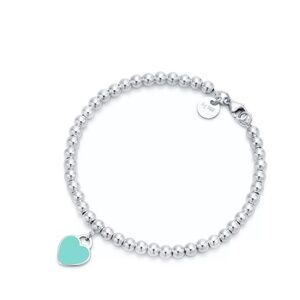 Tiffany set - earrings, bracelet, pendant. Return to Tiffany collection.